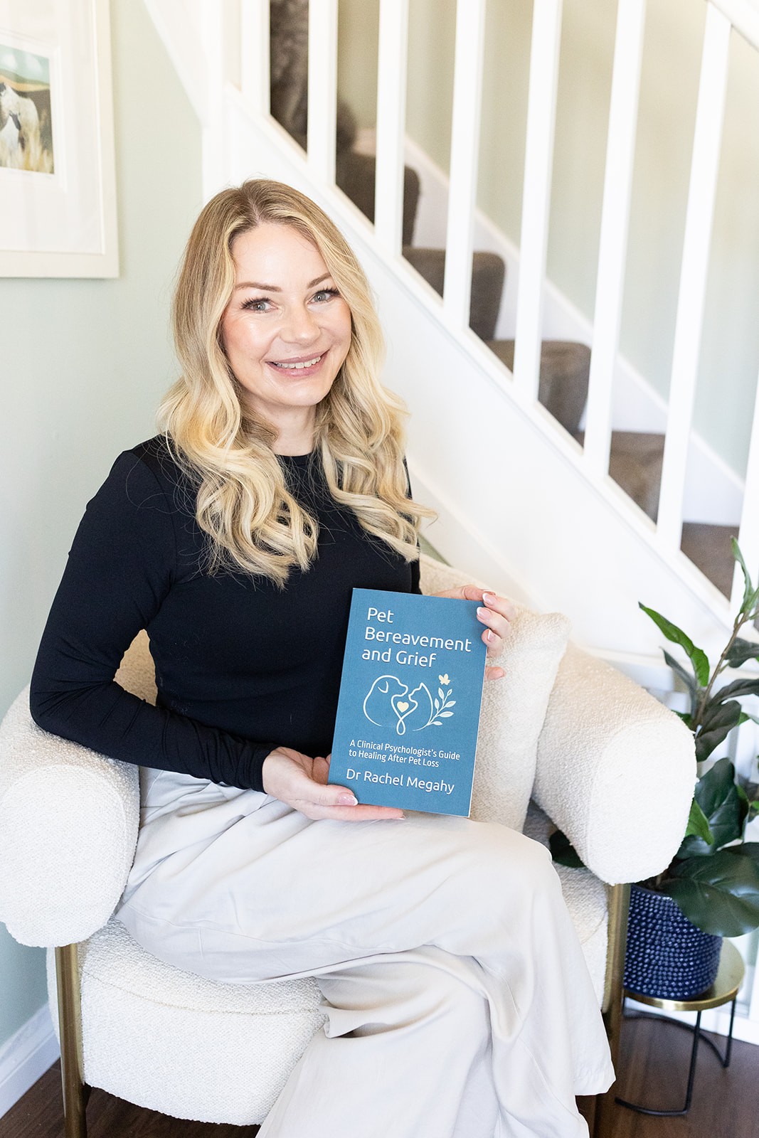 Dr Rachel Megahy holding Pet Bereavement and Grief